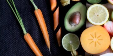 sliced vegetable and fruits on board